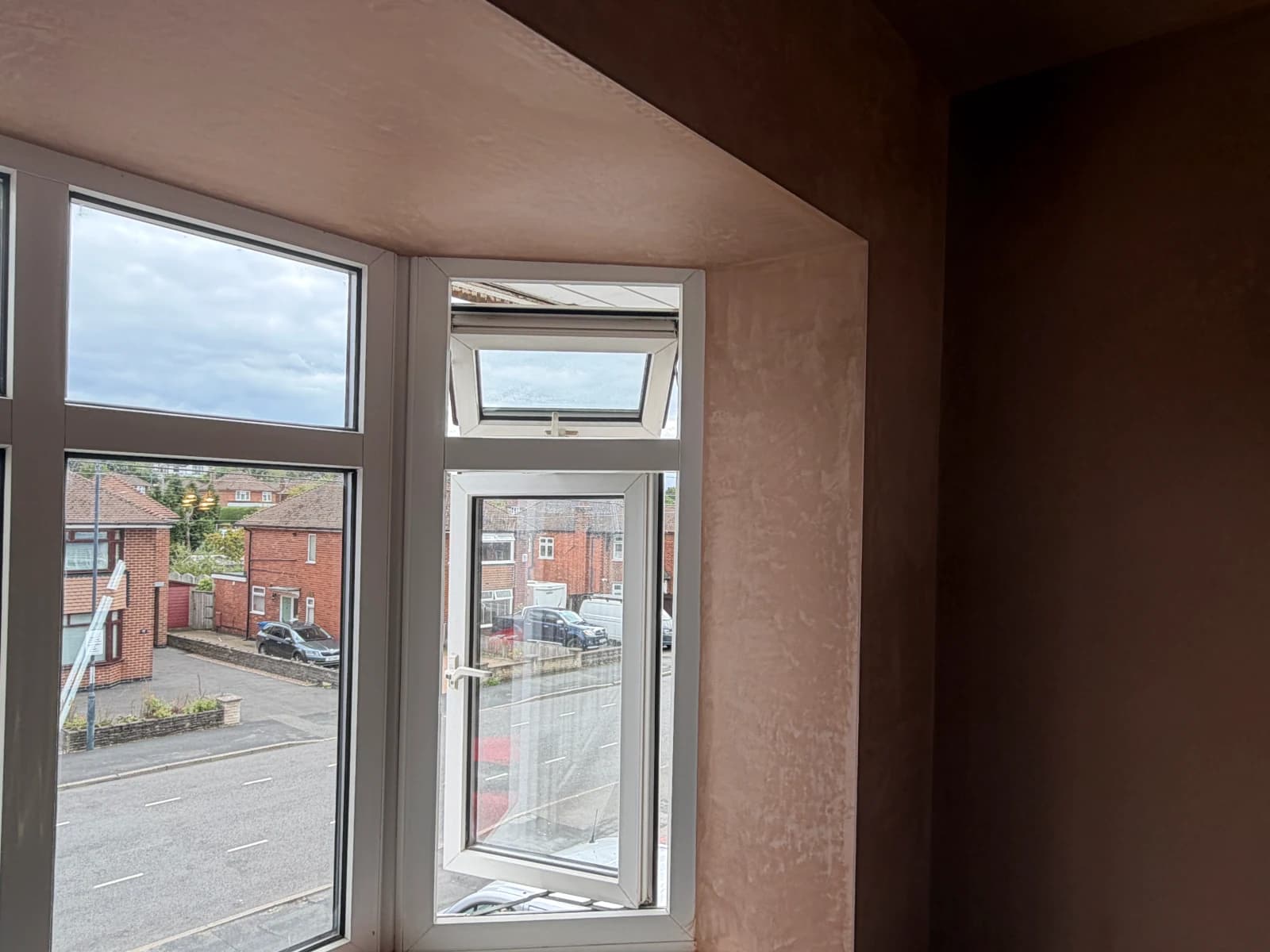 Repaired and freshly plastered bay window reveal in the Allestree bedroom