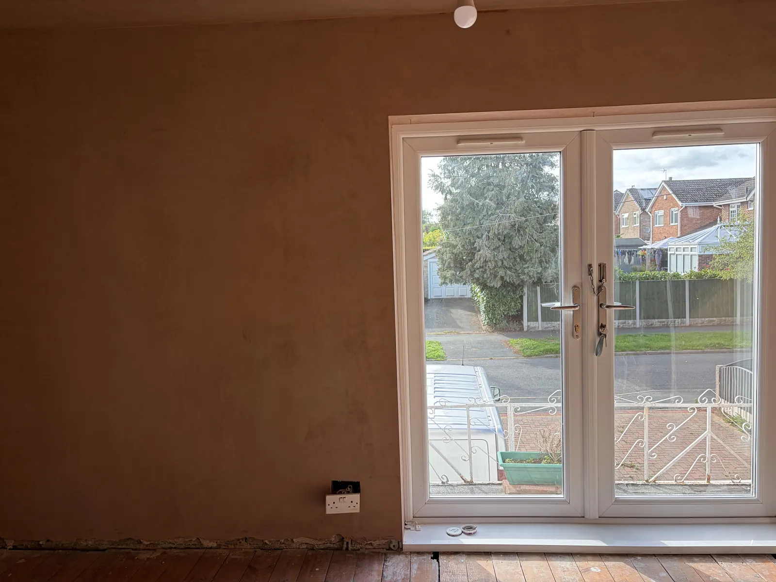 Freshly skimmed bedroom end wall in Allestree with the damaged plaster repaired