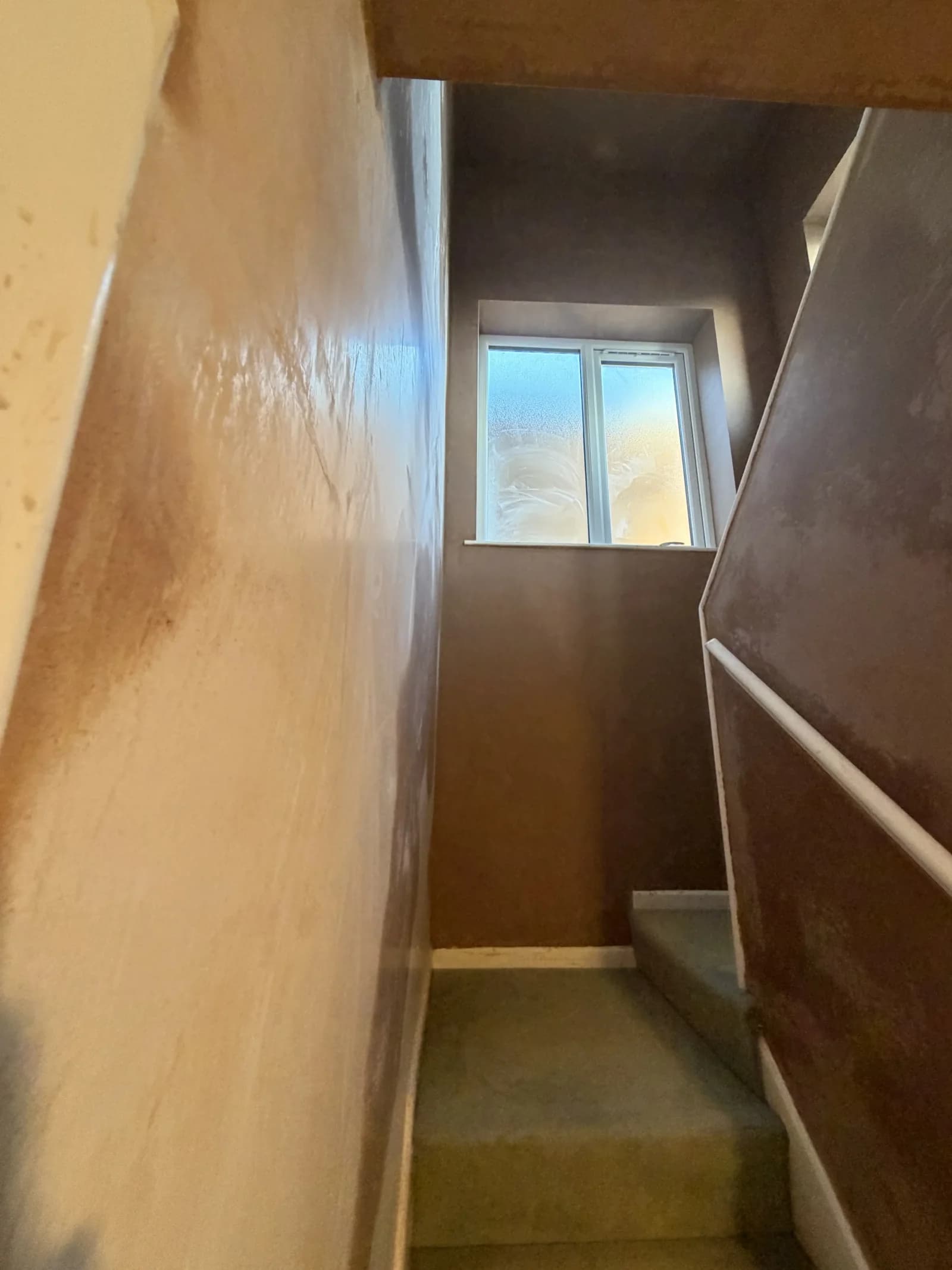 Finished plasterwork through the hallway