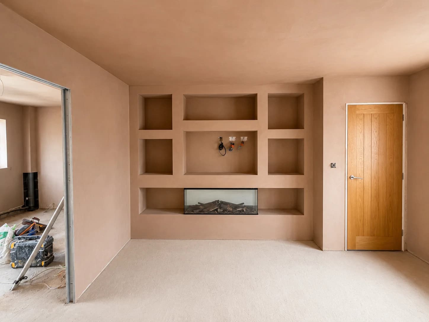 Media wall plastering and finishing in a living room