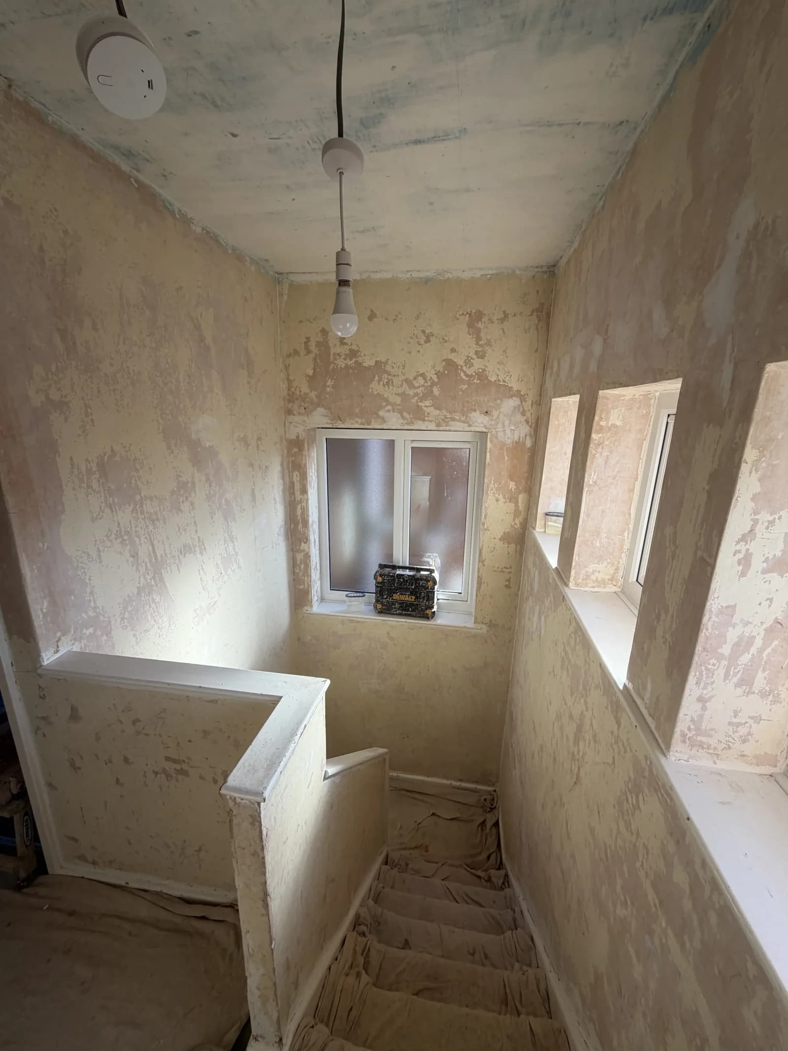 Hall, stairs and landing before preparation and plastering